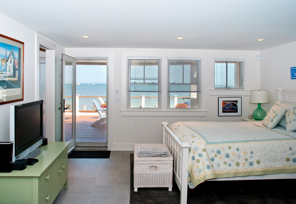 Design ideas for a beach style bedroom in Boston with white walls.