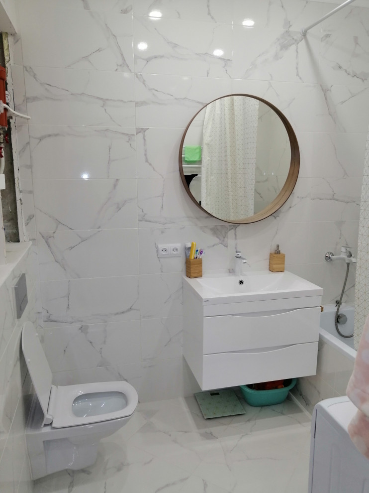 Design ideas for a bathroom in Saint Petersburg with white cabinets, white tile, mirror tile, white walls and a floating vanity.