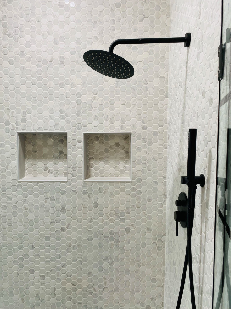 Large country 3/4 wet room bathroom in New York with ceramic tile, white walls, marble floors, white floor, a hinged shower door and vaulted.