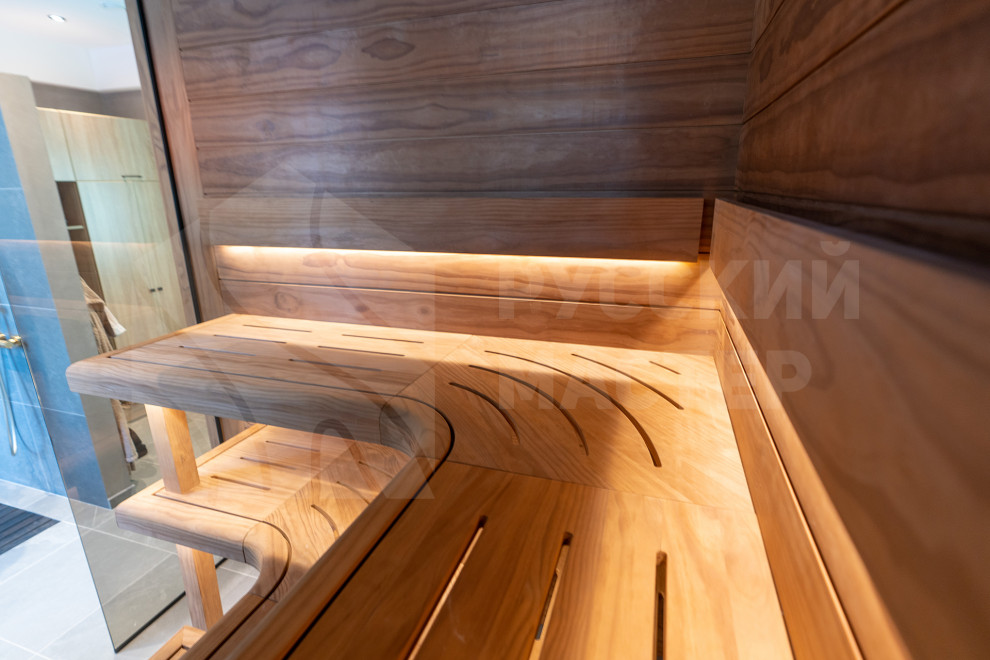 Сауна с изогнутыми полками из новозеландской сосны Pino Premio