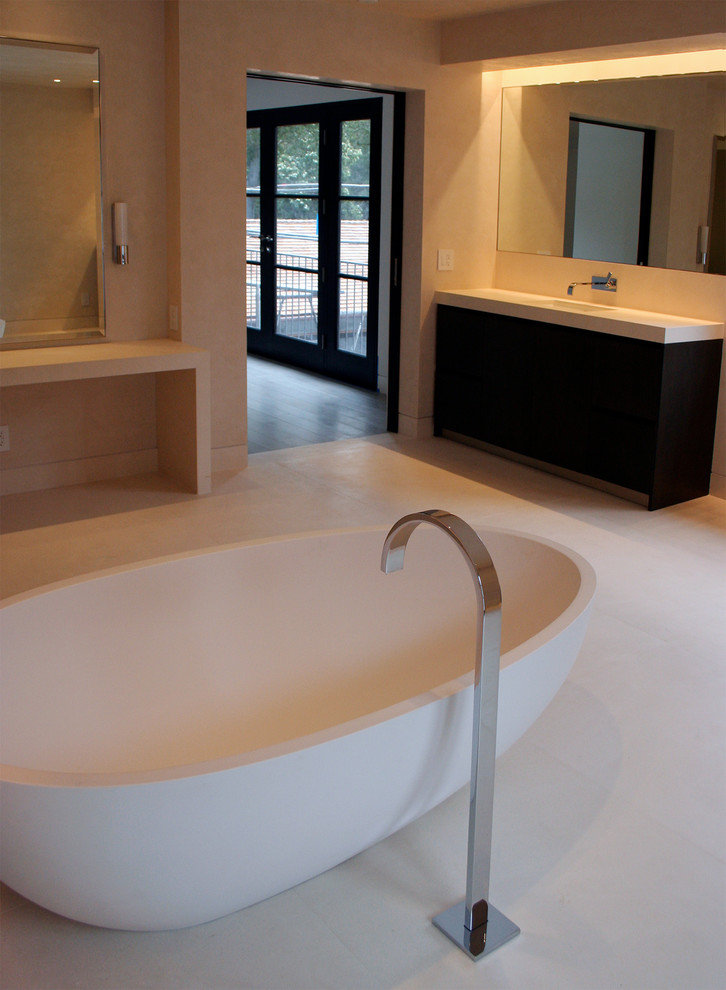 Large minimalist master beige tile and stone tile limestone floor freestanding bathtub photo in San Francisco