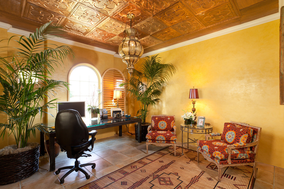 Large eclectic study room in Sacramento with yellow walls, ceramic floors and a freestanding desk.