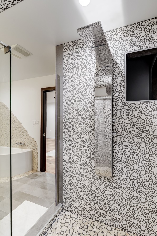 Mid-sized contemporary master bathroom in DC Metro with raised-panel cabinets, dark wood cabinets, a corner tub, an alcove shower, a one-piece toilet, mosaic tile, grey walls, medium hardwood floors, an integrated sink and solid surface benchtops.