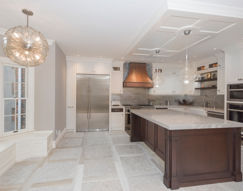 This is an example of a large contemporary u-shaped eat-in kitchen in New York with a drop-in sink, shaker cabinets, white cabinets, quartz benchtops, grey splashback, stone tile splashback, stainless steel appliances, ceramic floors, with island, grey floor, yellow benchtop and coffered.