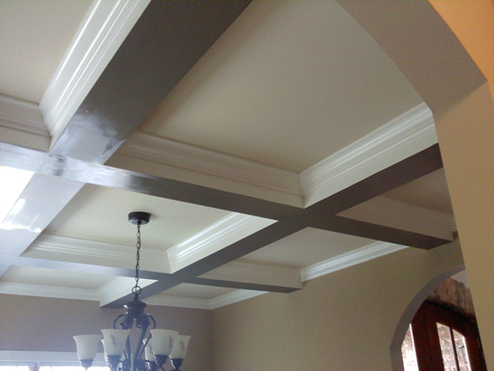 Transitional hallway photo in Charlotte with beige walls
