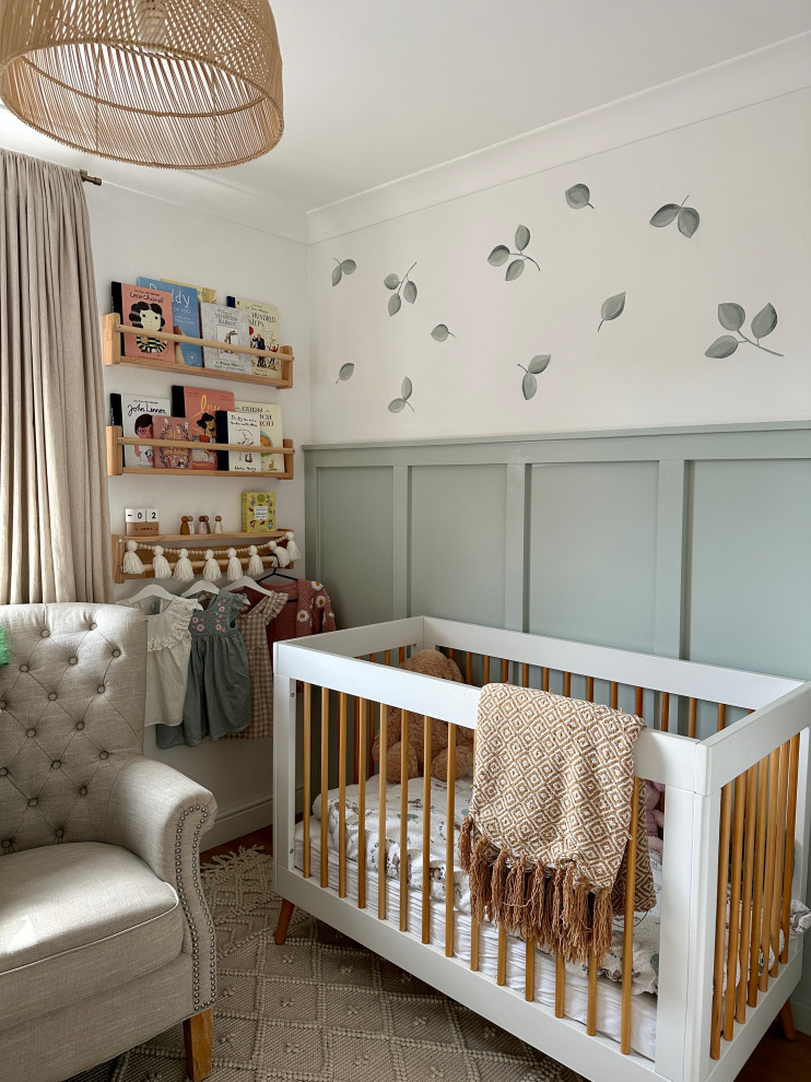 Example of a transitional nursery design in Other