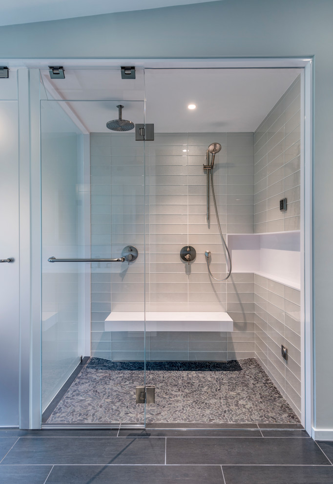 Contemporary master bathroom in Boston with flat-panel cabinets, a corner shower and a hinged shower door.