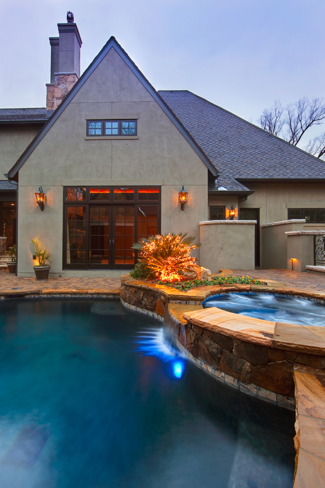 This is an example of a traditional custom-shaped pool in Charlotte.