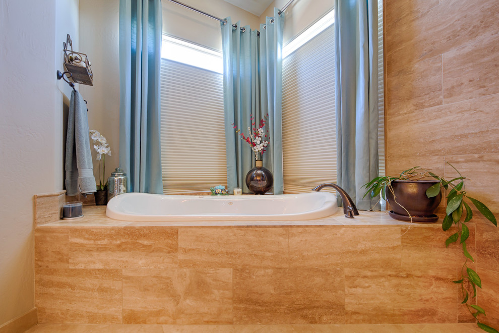 Drop-in bathtub - huge transitional master beige tile and travertine tile travertine floor and beige floor drop-in bathtub idea in Phoenix with a two-piece toilet