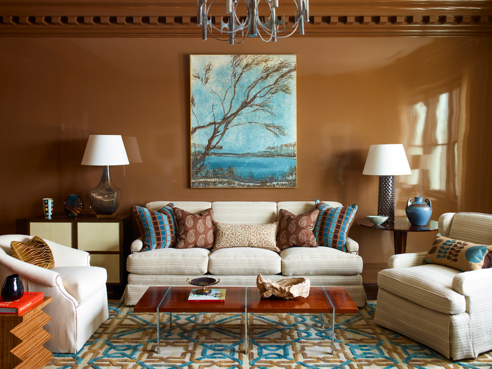 Photo of a transitional formal living room in New York with brown walls.