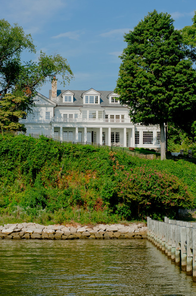 Huge elegant white three-story exterior home photo in Baltimore