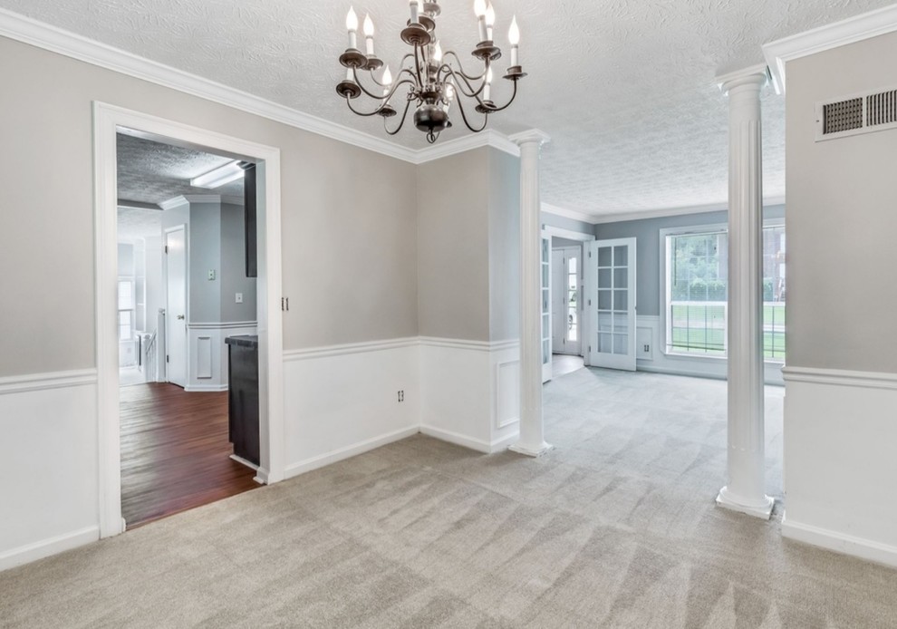 Mid-sized transitional separate dining room in Atlanta with grey walls, carpet, no fireplace and grey floor.