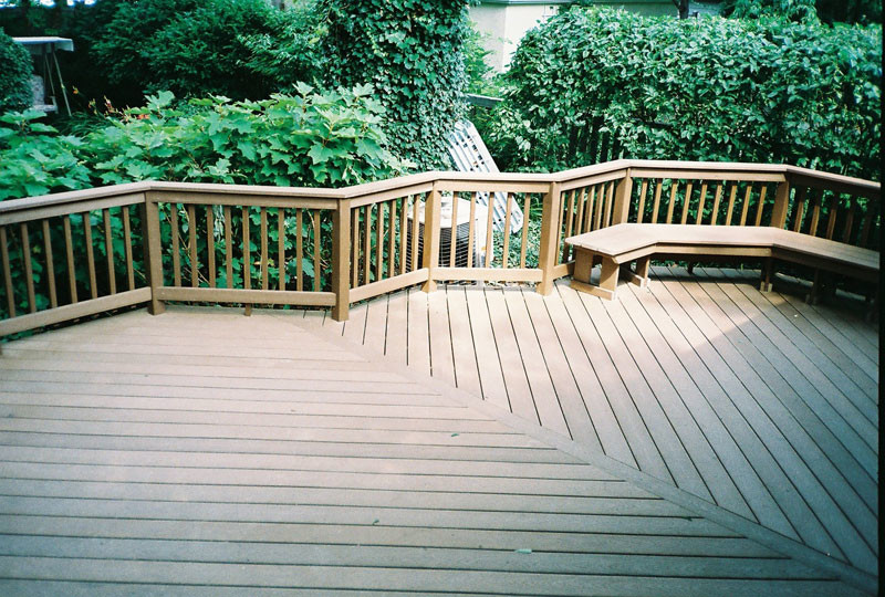 Mid-sized mountain style backyard deck photo in Chicago