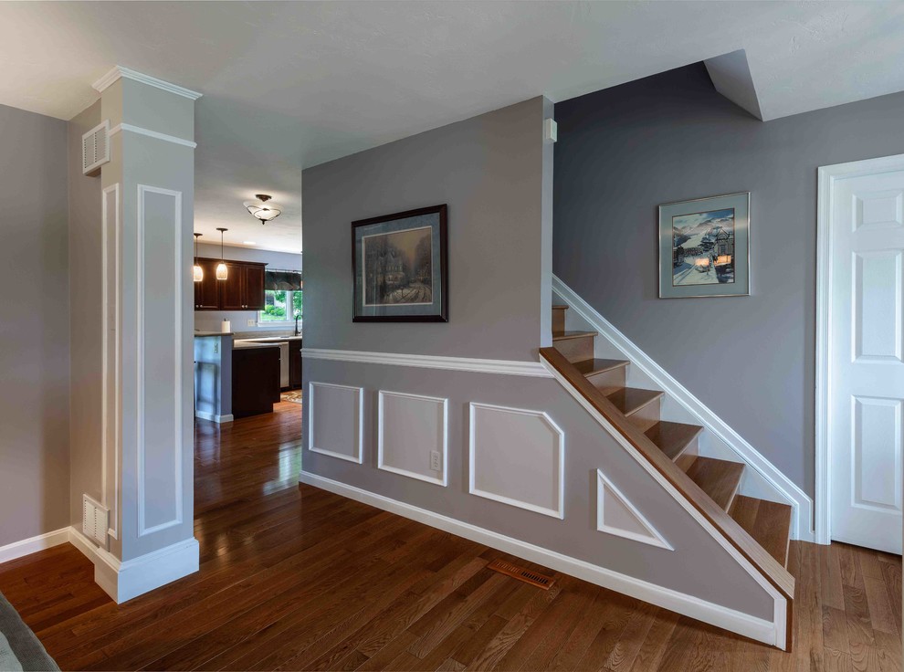 Mid-sized transitional wooden straight staircase photo with wooden risers