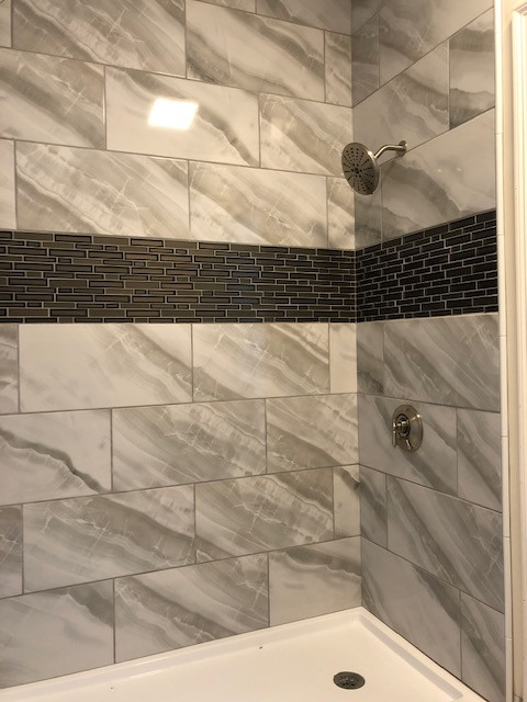 Large format tile shower remodel