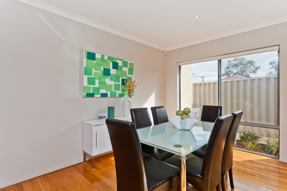 This is an example of a contemporary dining room in Perth.