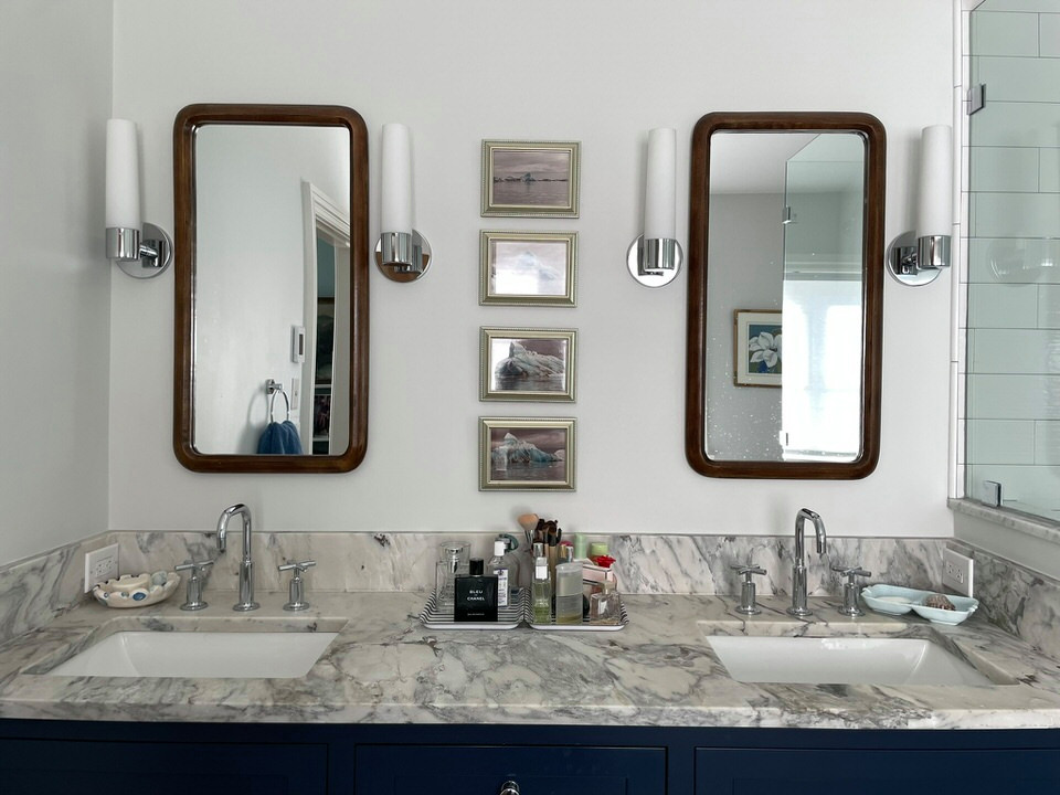 Mid-sized danish master white tile and subway tile double-sink corner shower photo in Providence with shaker cabinets, blue cabinets, gray walls, an undermount sink, quartzite countertops, a hinged shower door, gray countertops and a built-in vanity