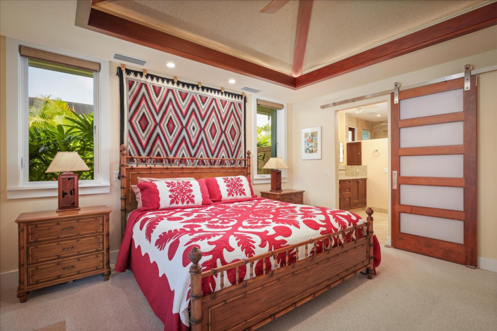 Immagine di una grande camera da letto tropicale