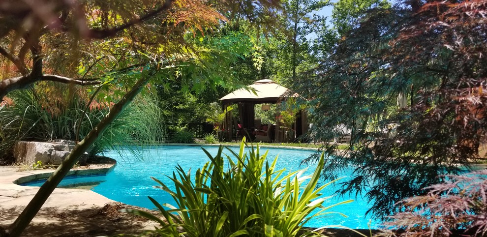 Inspiration for a rustic pool remodel in Birmingham