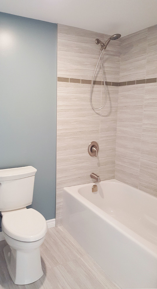 Example of a large transitional porcelain tile and gray floor basement design in Toronto with blue walls