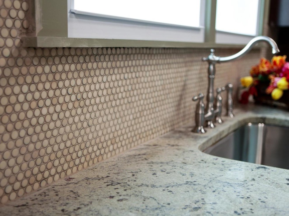 Kitchen - mid-sized transitional kitchen idea in Boston with an undermount sink, granite countertops, beige backsplash, ceramic backsplash and gray countertops