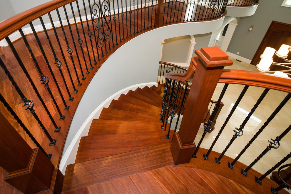 This is an example of an expansive transitional curved staircase in DC Metro.