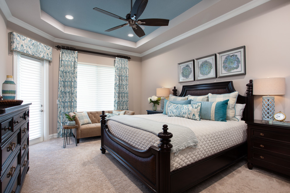 Design ideas for a mid-sized transitional master bedroom in Orlando with grey walls, carpet and beige floor.