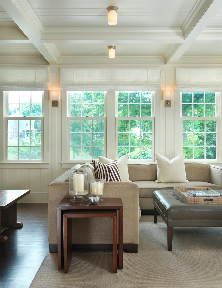 Design ideas for a traditional family room in Boston with dark hardwood floors.