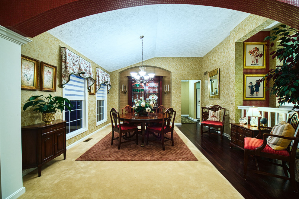 Photo of a mid-sized traditional separate dining room in Cleveland with metallic walls, carpet, no fireplace and multi-coloured floor.