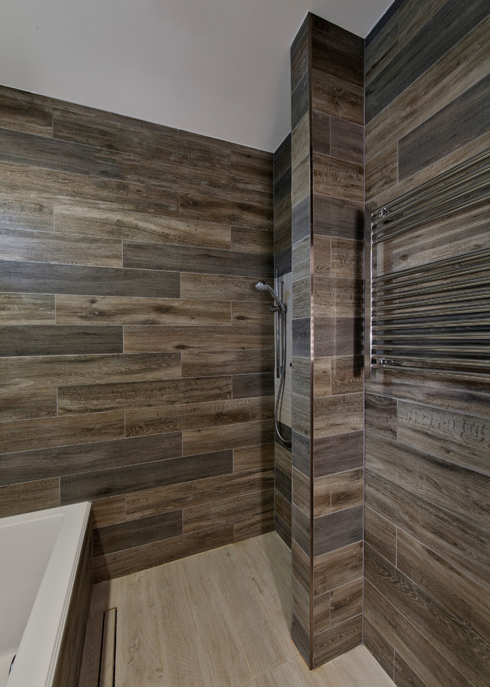 Inspiration for a small asian master bathroom in DC Metro with a drop-in tub, an open shower, brown tile, porcelain tile, brown walls, porcelain floors, beige floor and an open shower.
