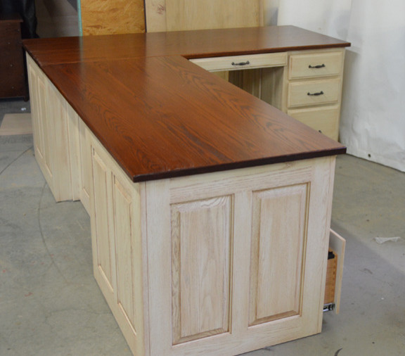 L shaped desk with indent for customer seating