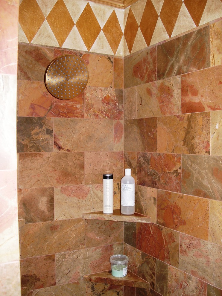 Inspiration for a small mediterranean master bathroom in San Francisco with a one-piece toilet, blue tile, multi-coloured tile, porcelain floors, flat-panel cabinets, dark wood cabinets, a corner shower, stone tile, granite benchtops, red walls and a drop-in sink.