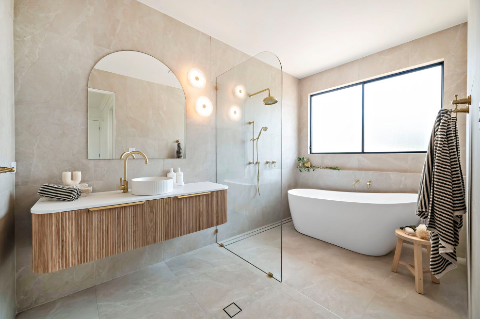 Design ideas for a contemporary wet room bathroom in Central Coast with furniture-like cabinets, medium wood cabinets, a freestanding tub, engineered quartz benchtops, an open shower, a single vanity and a floating vanity.