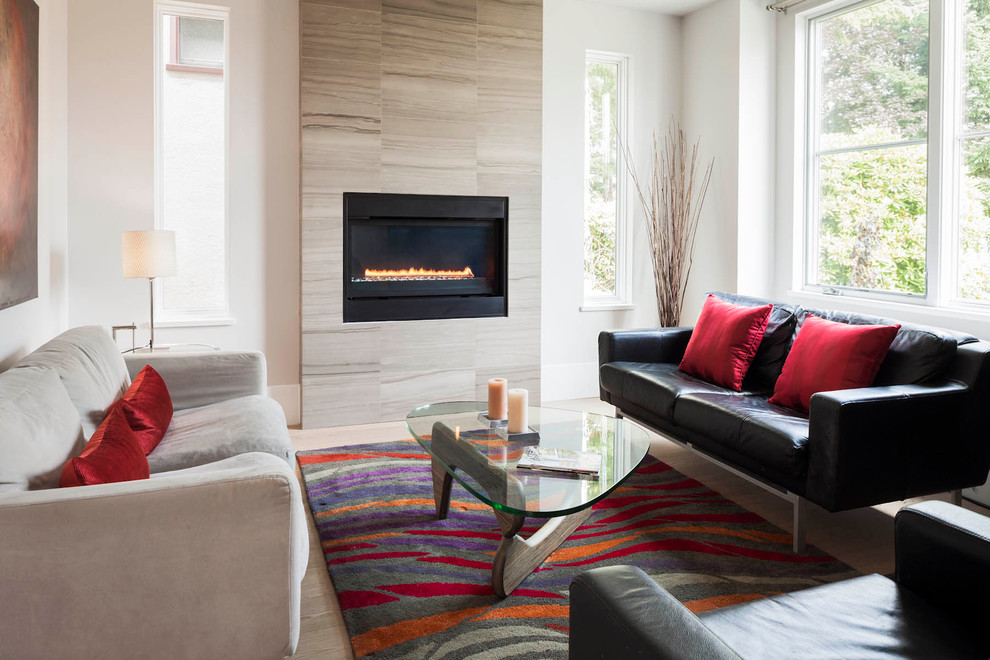 Mid-sized contemporary living room in Vancouver with white walls and a ribbon fireplace.