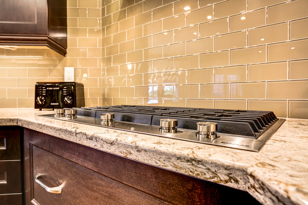 Example of a transitional kitchen design in Toronto