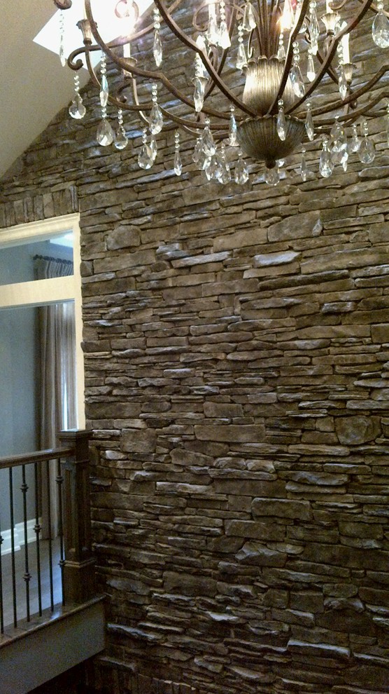 Example of a transitional home design design in Toronto