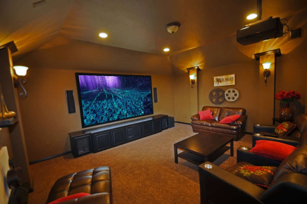 Design ideas for a modern enclosed home theatre in Dallas with orange walls, carpet and a projector screen.