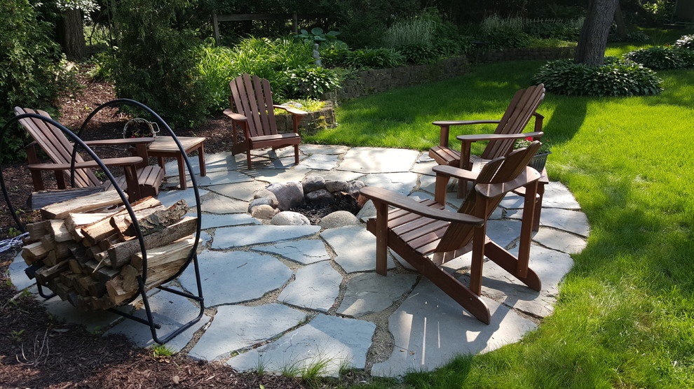 Design ideas for a mid-sized transitional shade backyard stone outdoor basketball/tennis/multi-game court in Chicago for fall.