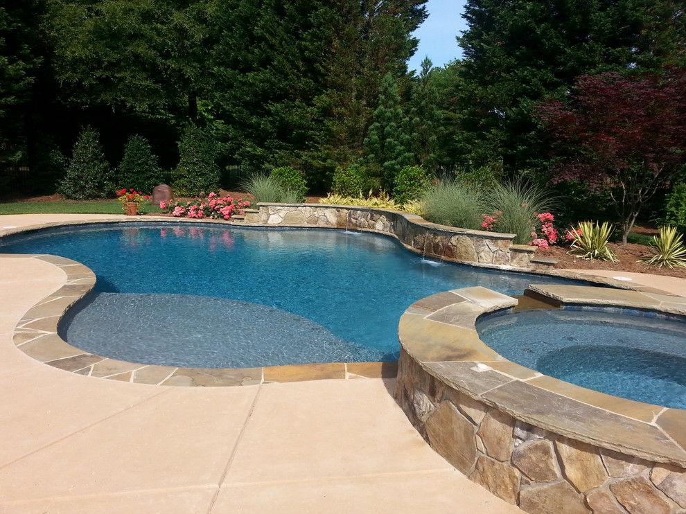 Transitional pool photo in Charlotte