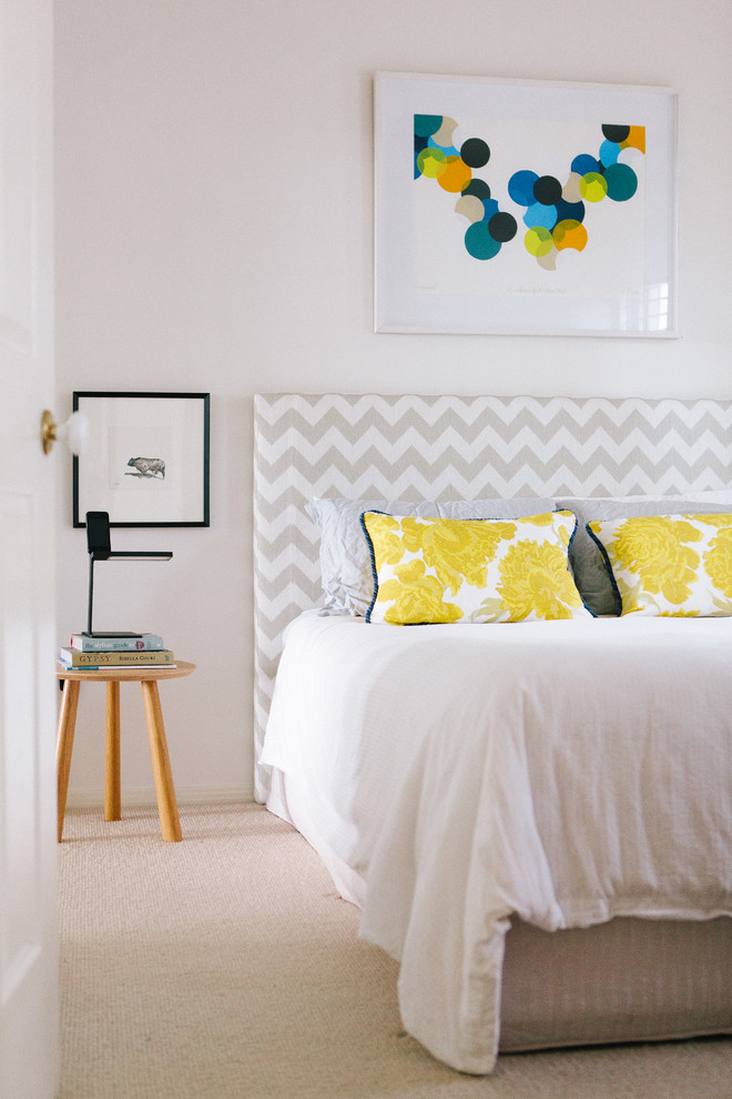 Design ideas for a transitional bedroom in Brisbane with white walls and carpet.