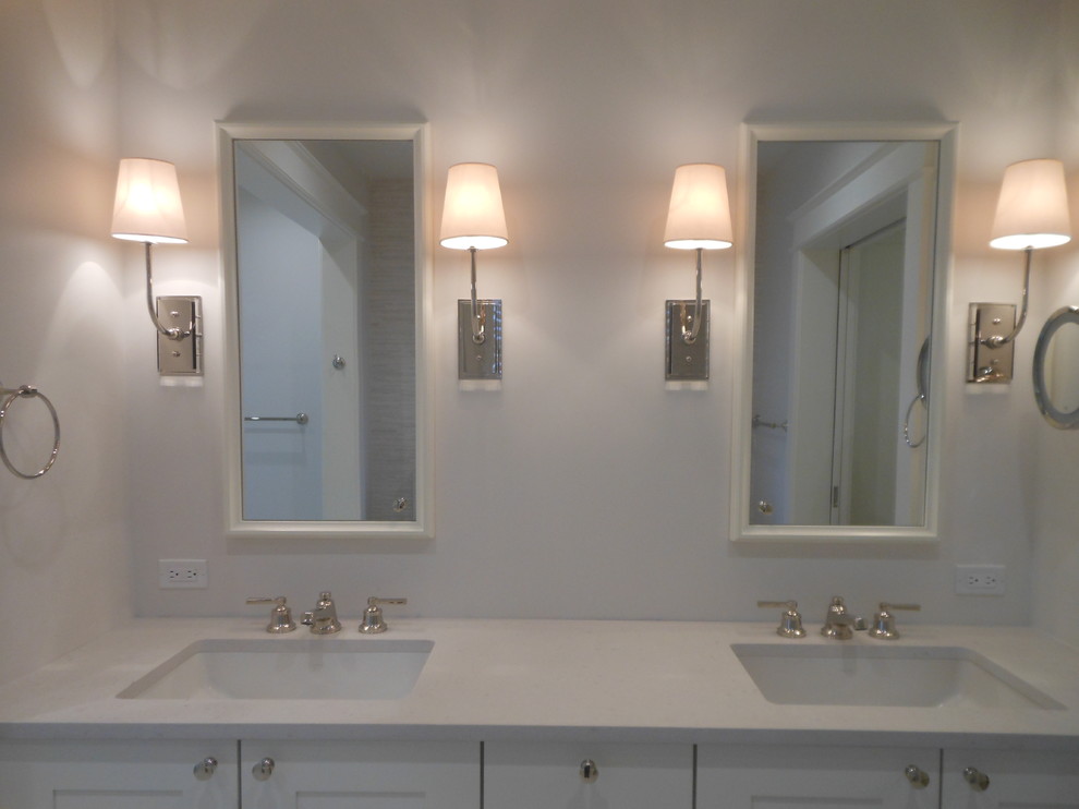 Photo of a transitional bathroom in DC Metro with an undermount sink, shaker cabinets, white cabinets, engineered quartz benchtops, white tile and porcelain tile.
