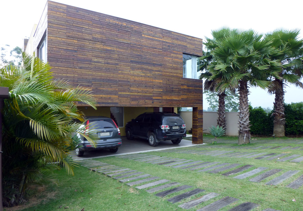 Photo of a mid-sized country attached three-car carport in Other.