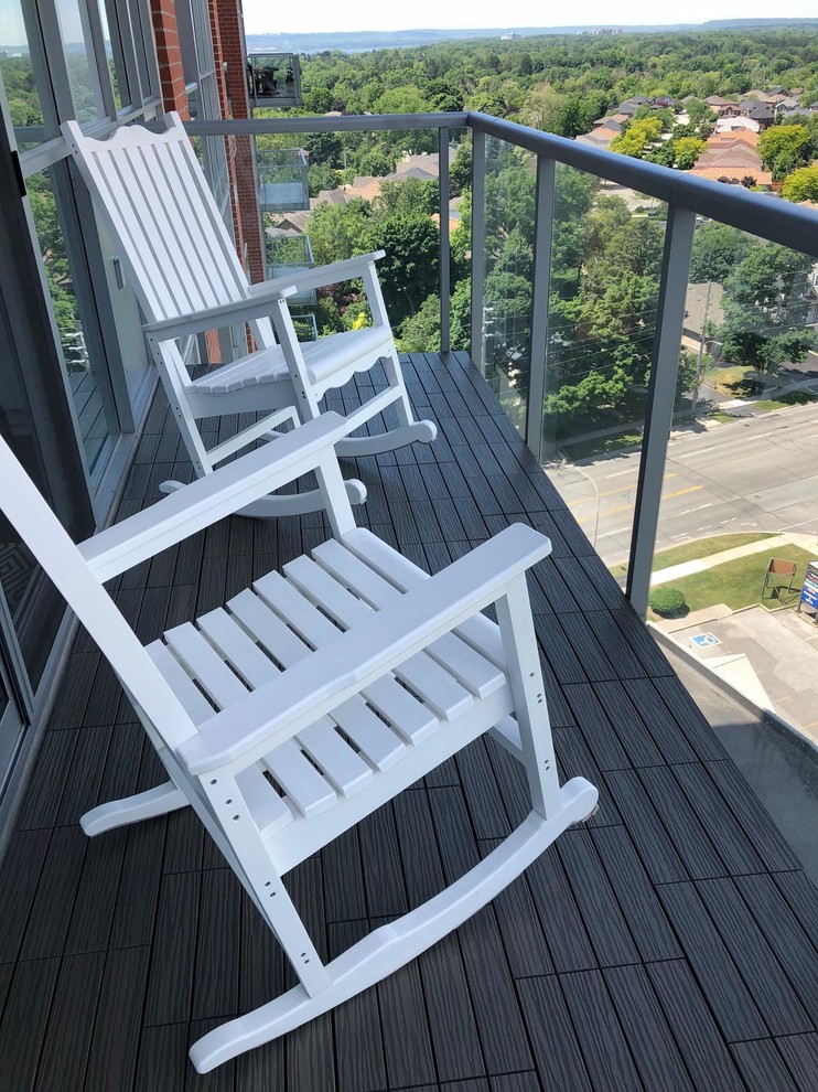 This is an example of a small modern balcony in Toronto.