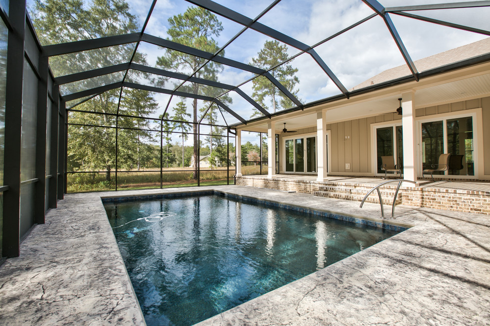 Large transitional indoor concrete and rectangular lap pool house photo in Atlanta