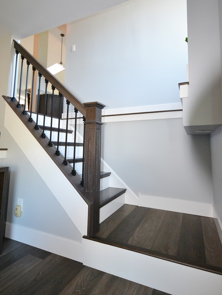 Photo of a large transitional staircase in Philadelphia.