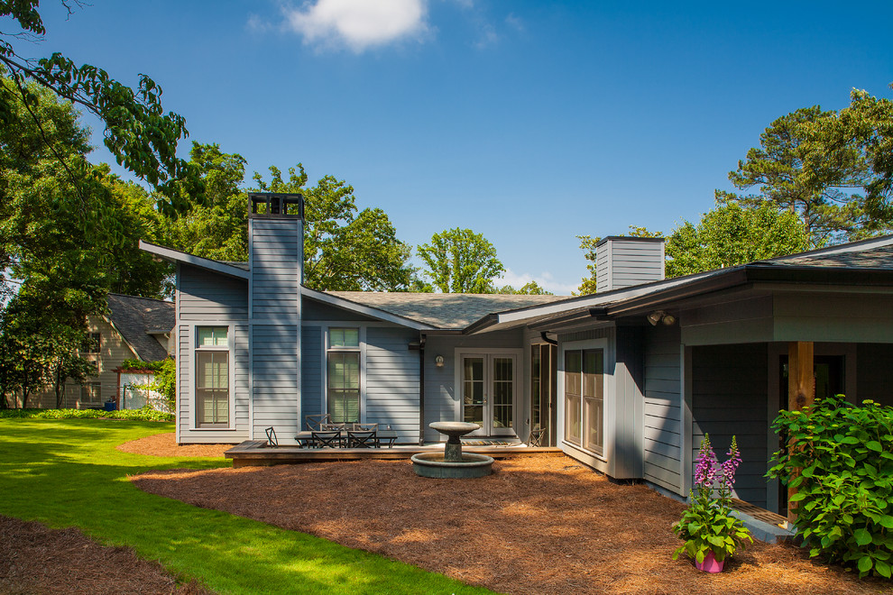 Design ideas for a traditional grey exterior in Atlanta with a shed roof.