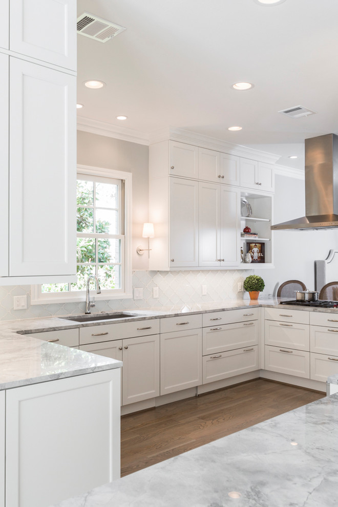 Example of a transitional kitchen design in Houston