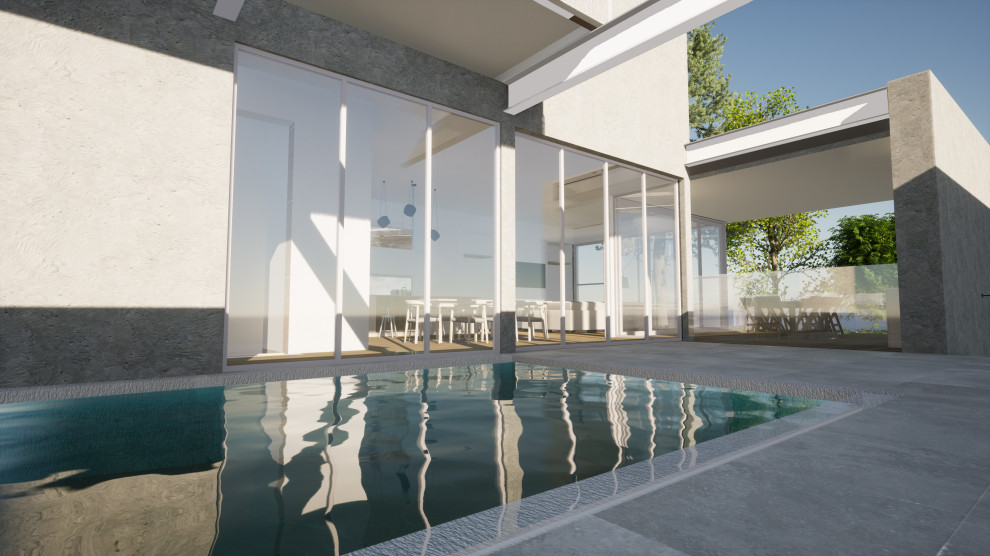 Example of a small trendy courtyard tile and rectangular privacy pool design in Melbourne