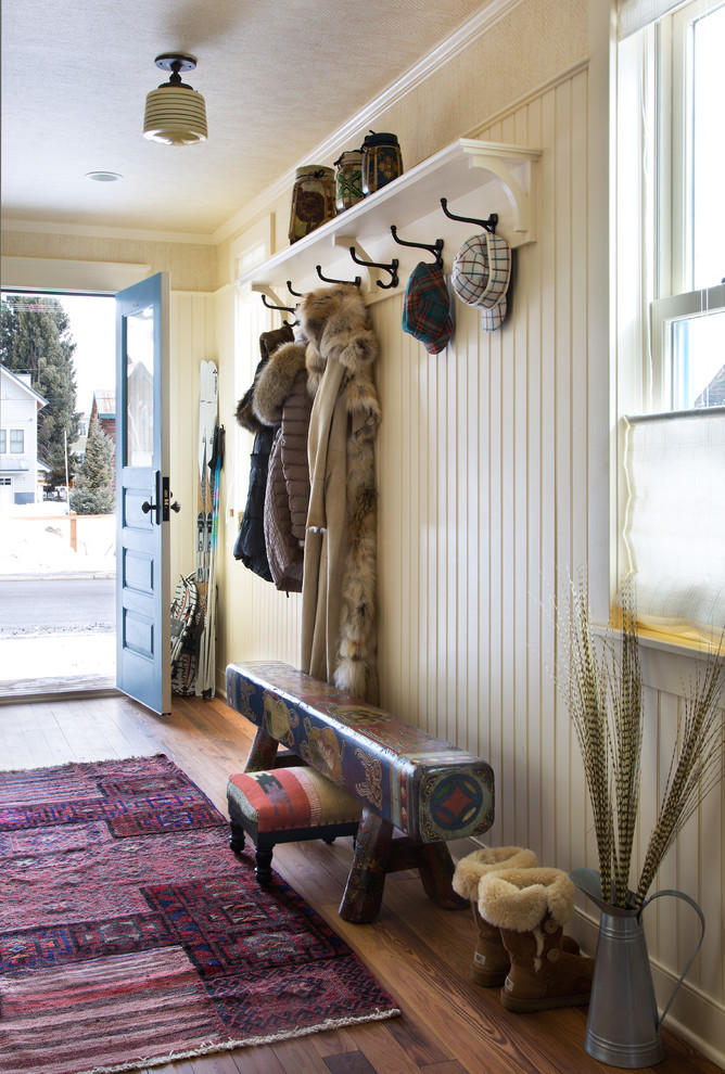 Eclectic entryway photo in Denver