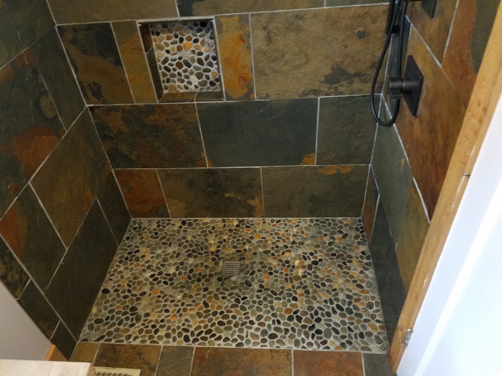 Design ideas for a small country 3/4 bathroom in Cincinnati with louvered cabinets, light wood cabinets, a curbless shower, a bidet, multi-coloured tile, slate, beige walls, slate floors, a vessel sink, wood benchtops, multi-coloured floor and an open shower.